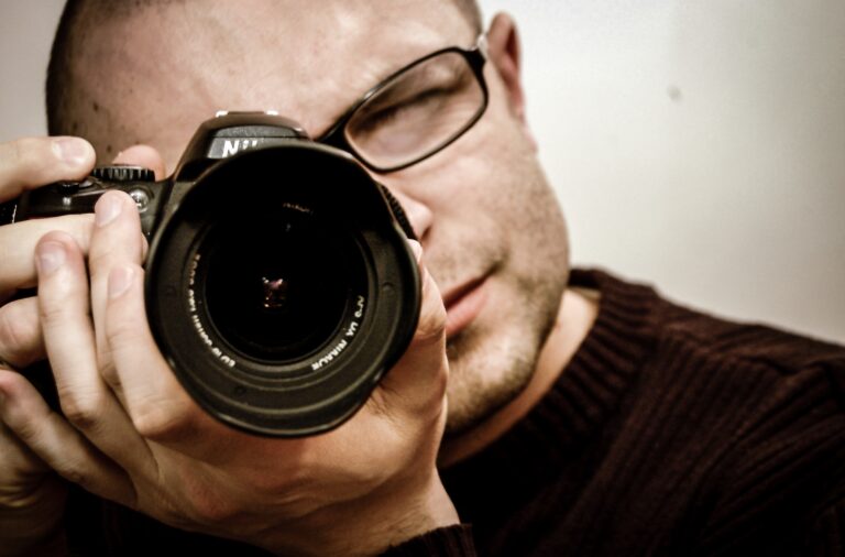 man behind camera