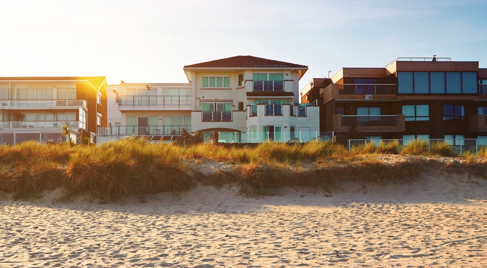 Photo of beach houses at sunset