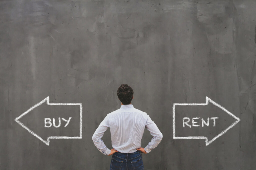 buy or rent choice, real estate concept, businessman making decision rent vs. buy price to rent ratio